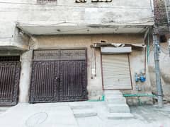 9 Marla House With 1 Shop Is Available For Sale In Wafaqi Colony Lahore.