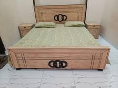 Double bed with two side tables in excellent condition