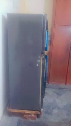 a used fridge in New condition is for sale