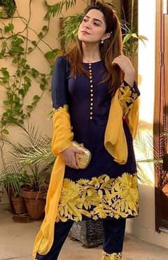 3 pcs womans unstitched lawn Embroidered suit.