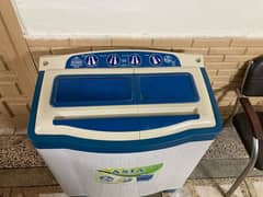 Asia washing machine plus dryer for sale.