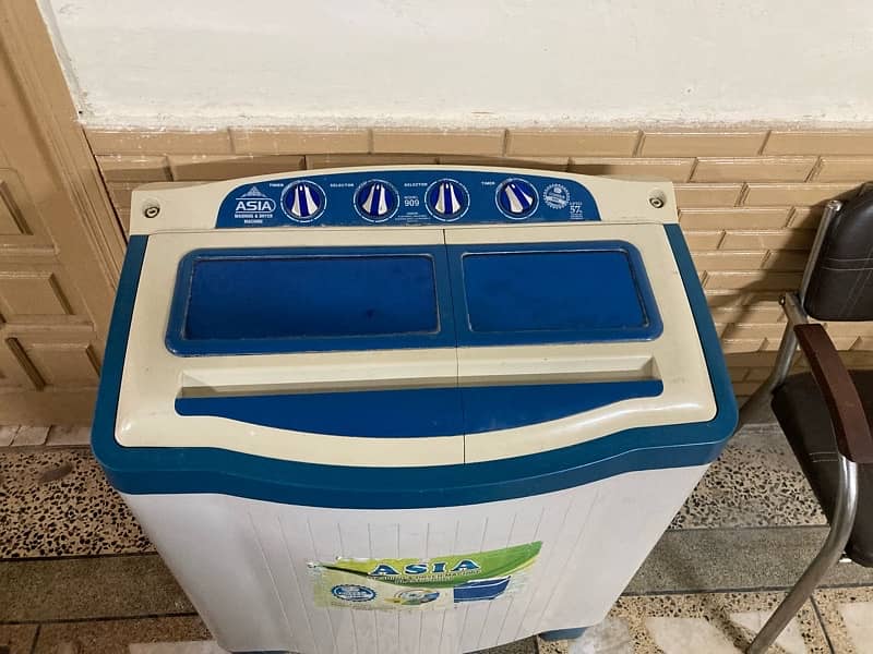 Asia washing machine plus dryer for sale. 0