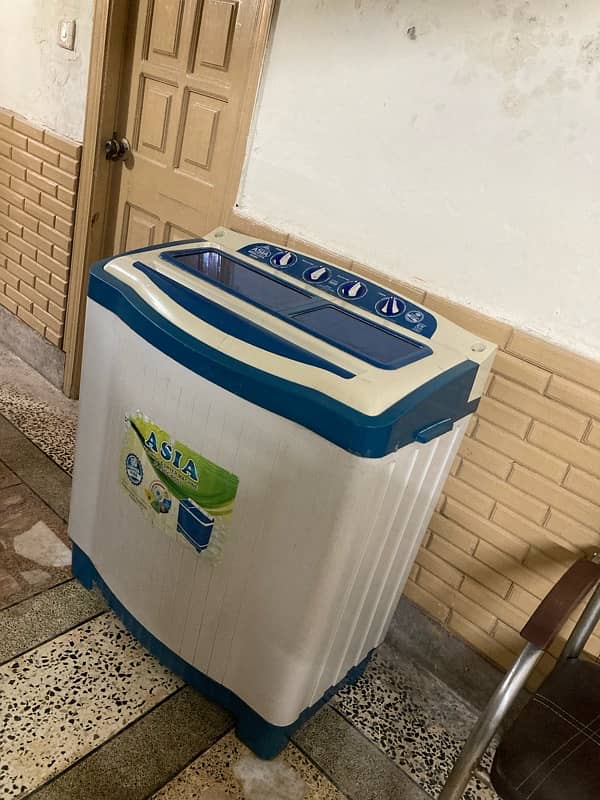 Asia washing machine plus dryer for sale. 1