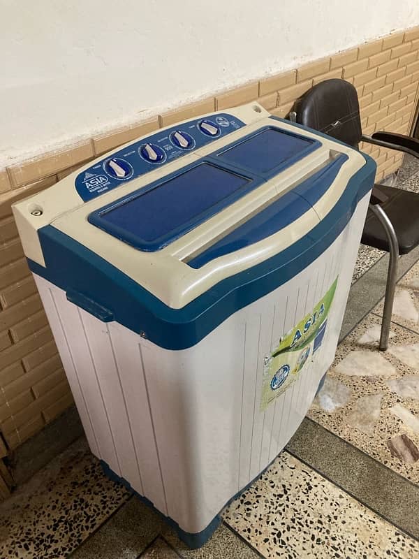 Asia washing machine plus dryer for sale. 2