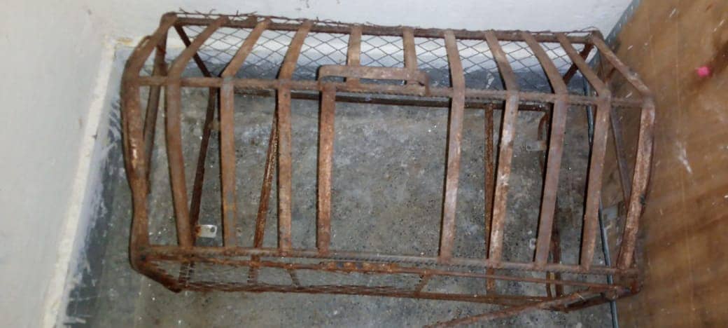 HEAVY IRON CAGE MADE FROM RODS . 0