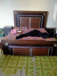 double bed with 2 side tables