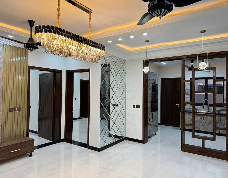 10 Marla Designer House Double Heighted Lobby is for Sale in Awais Qarni Block Bahria Town 2