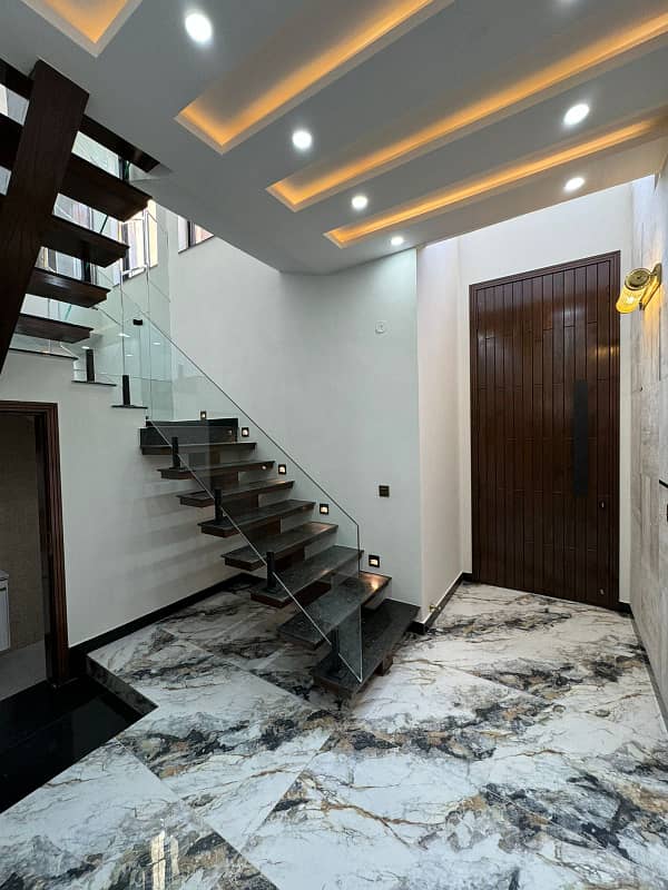 10 Marla Designer House Double Heighted Lobby is for Sale in Awais Qarni Block Bahria Town 16