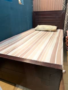 single wooden bed