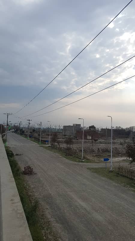 Centrally Located Residential Plot In Model Town Is Available For sale 2