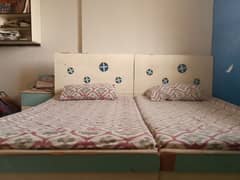 Two single beds use for sale with mattress