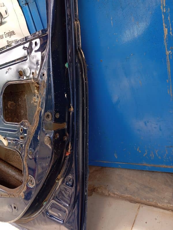 vitz 2003 door 0