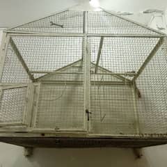 a cage for birds and hens