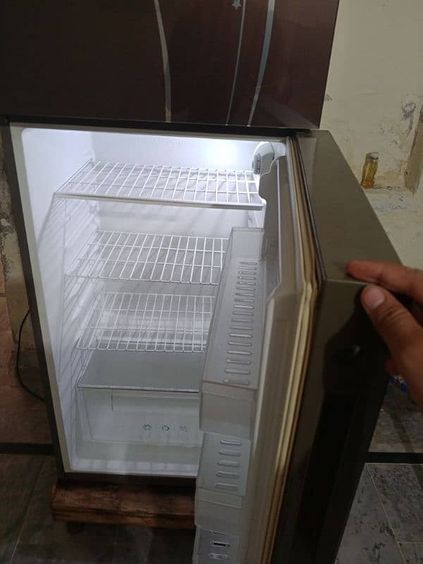 HAIER FRIDGE URGENT FOR SALE FULL OK 10 BY 10 CONDITION 9