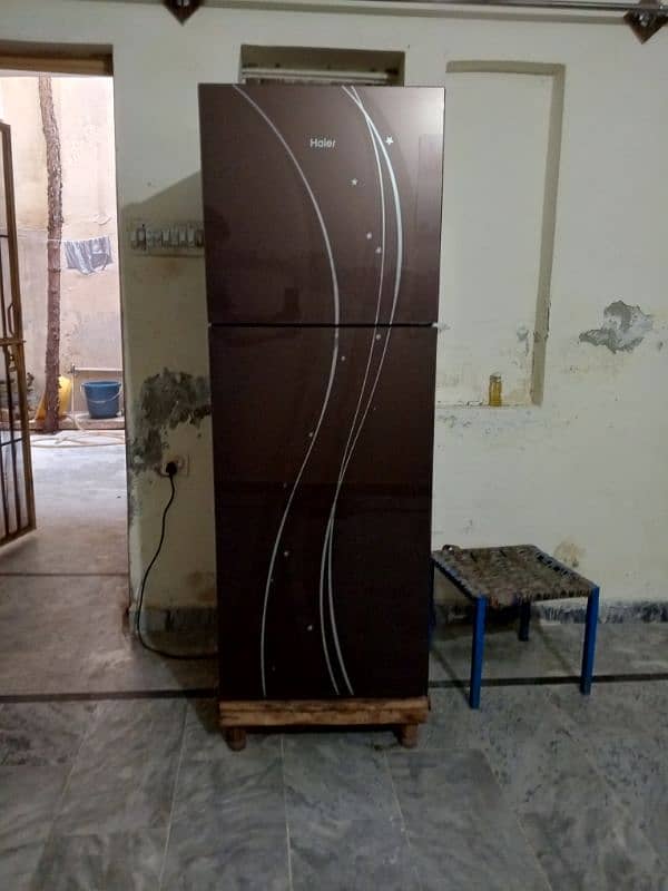 HAIER FRIDGE URGENT FOR SALE FULL OK 10 BY 10 CONDITION 0