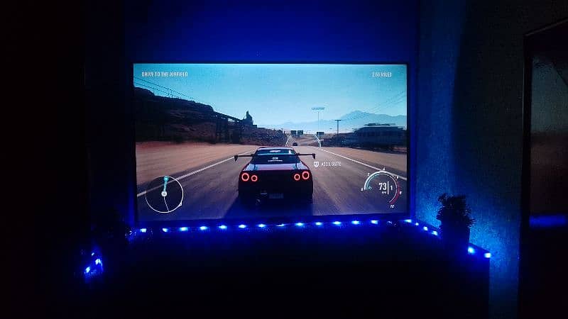 PlayStation 4 1TB edition Gaming setup with 32inch 1080p smart LED 1