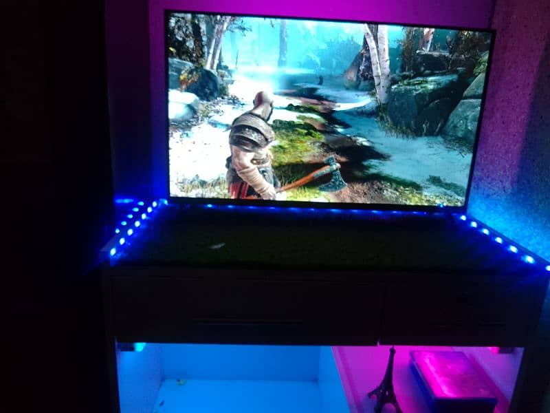 PlayStation 4 1TB edition Gaming setup with 32inch 1080p smart LED 2