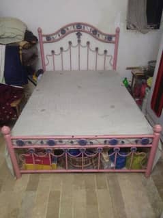 pink bed and dressing