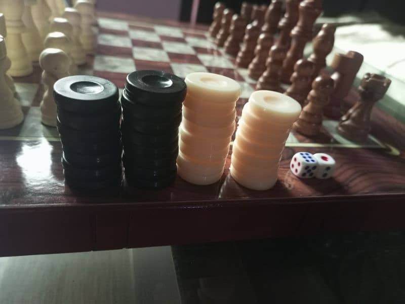 Wooden chess, checkers and backgammon. 2