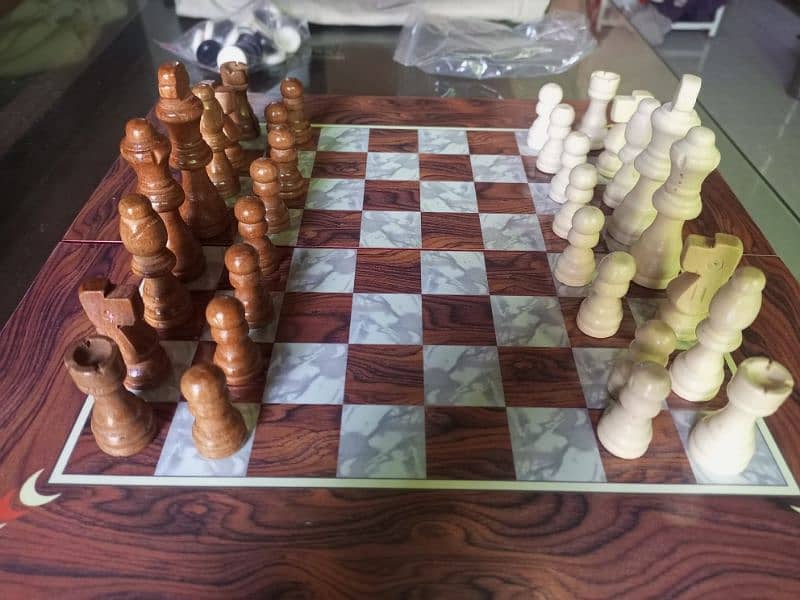 Wooden chess, checkers and backgammon. 1