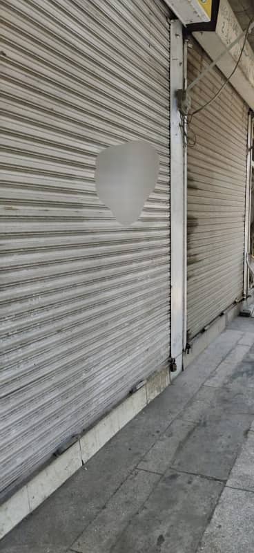 COMMERCIAL SHOP FOR SALE IN KARIM BLOCK MARKET ALLAMA IQBAL TOWN 0