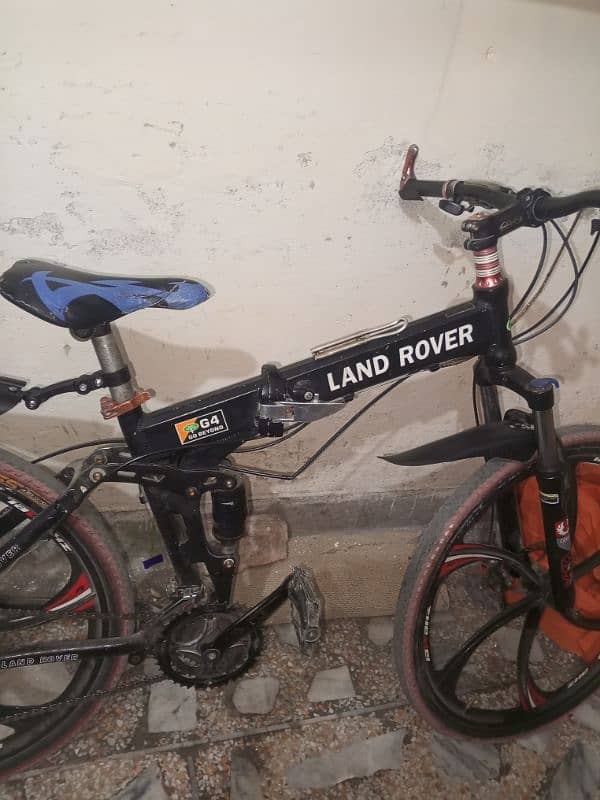 land Rover folding scycle for. sale urgent sale karni ha 5