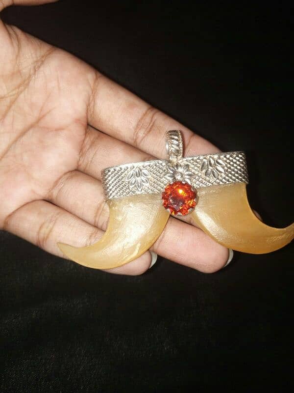 Original lion nail pendant 1