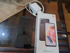 Redmi note 12 with original box and charger