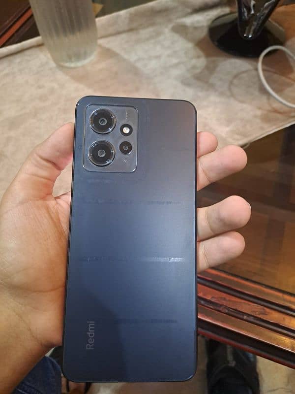 Redmi note 12 with original box and charger 1