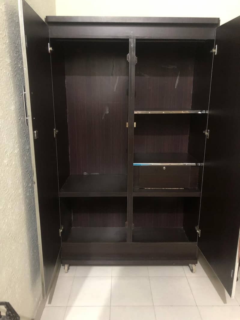 Almost new 2 door wooden wardrobe 1