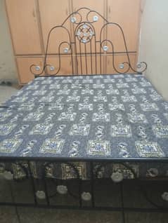 Iron bed with mattress