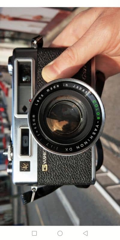 Vintage Yashica camera with flashgun 5