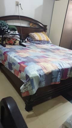 One king size bed with two mattresses of double size bed and one dres