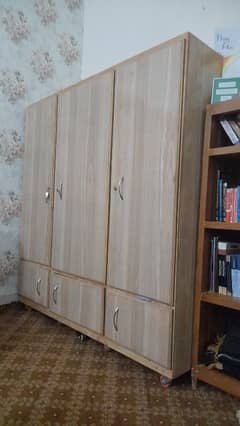 wooden wardrobe cupboard with customised wheels