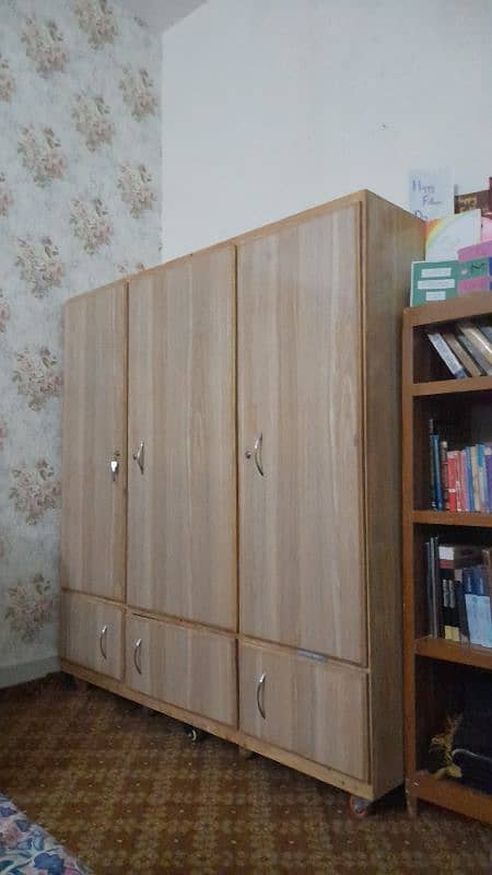 wooden wardrobe cupboard with customised wheels 1