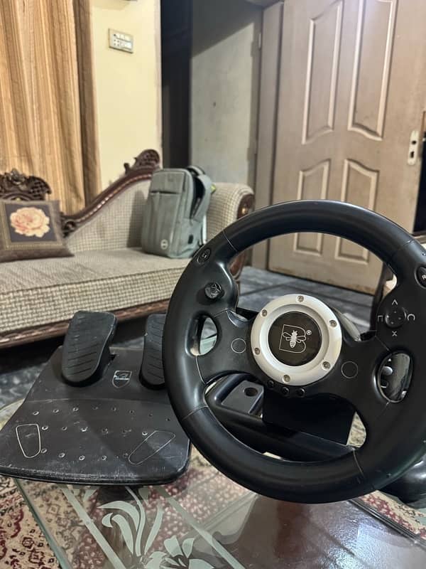 Steering wheel with pedals 1