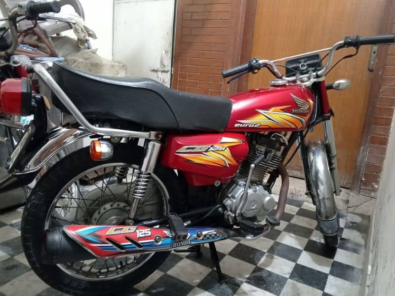 Honda cg 125 20/21 head side pack all punjab num 0