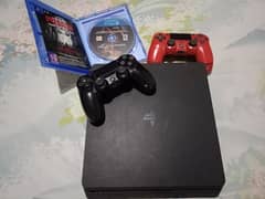 playstation 4 slim with 2 controllers and tekken 7 game 0