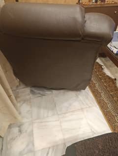 Master recliner chocolate brown. revolving. Whatsapp msg. DHA