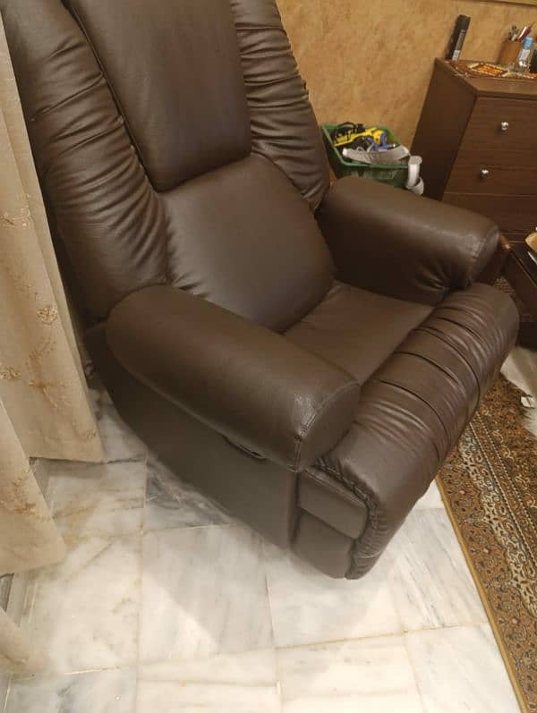 Master recliner chocolate brown. revolving. Whatsapp msg. DHA 1