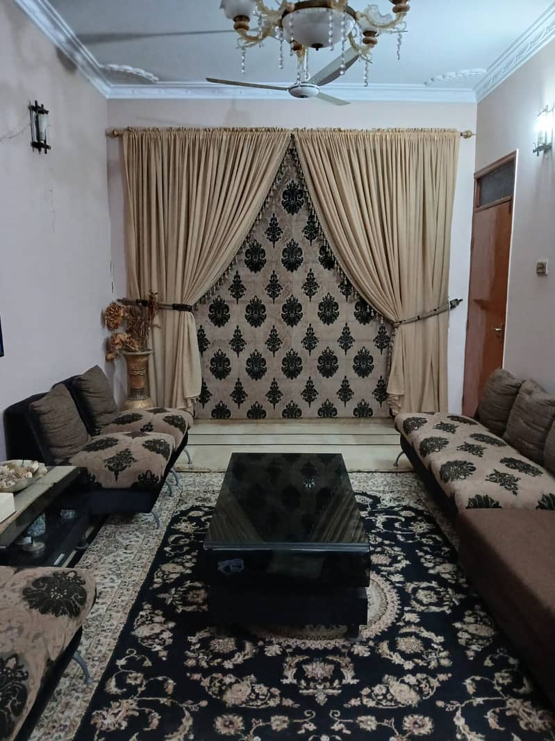 Seven seater sofa set with curtain and rug 3