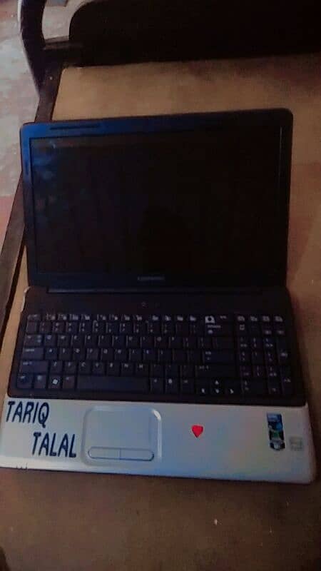 compaq ka laptop hai compaq is 2nd name of hp company 7