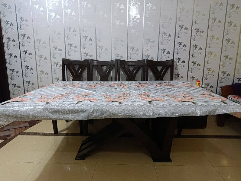 full size Dining table with 6 chairs. Glass top with marbled sheet 0