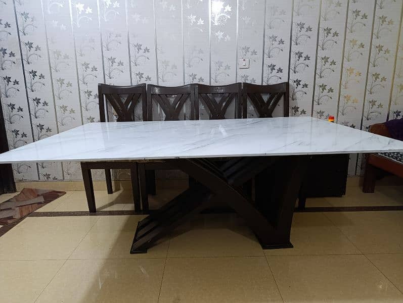 full size Dining table with 6 chairs. Glass top with marbled sheet 3