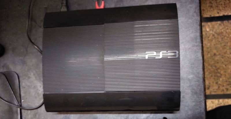 Ps3 super slim 500gb jail break with 2 controllers and a hdmi cable. 3