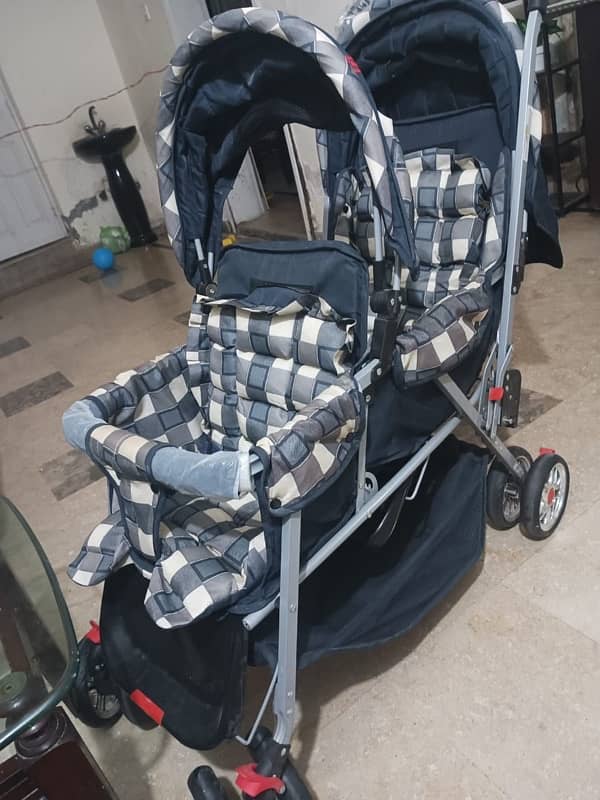 Twin baby stroller and car seat 1