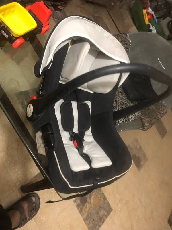 Twin baby stroller and car seat 7