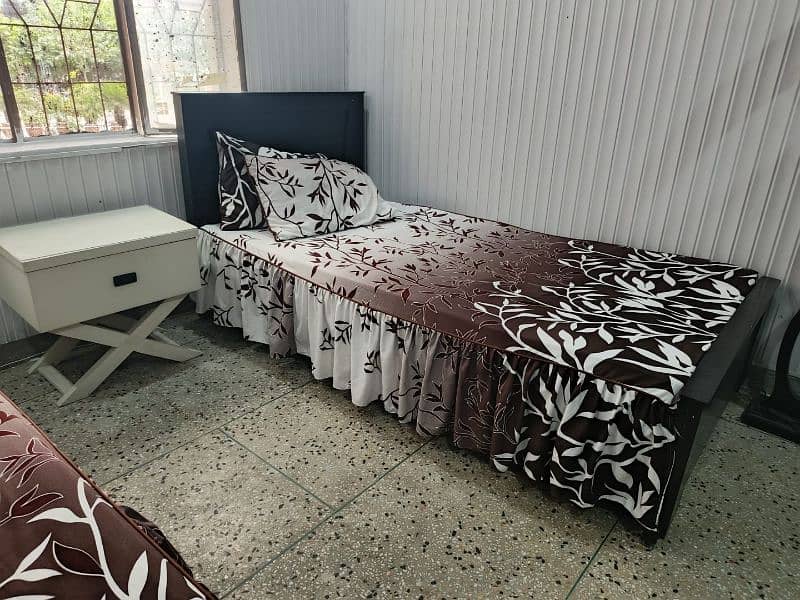 Two Single beds with two side tables 3