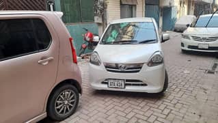 Daihatsu Mira es eis pearl white 2011