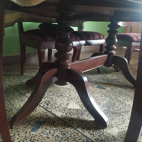 Used Wooden Dining table with 6 Chairs , condition 5/10 2